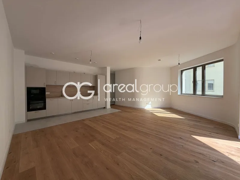 Großzügig & lichtdurchflutet: Neubauwohnung mit besonderer Architektur — photo 1